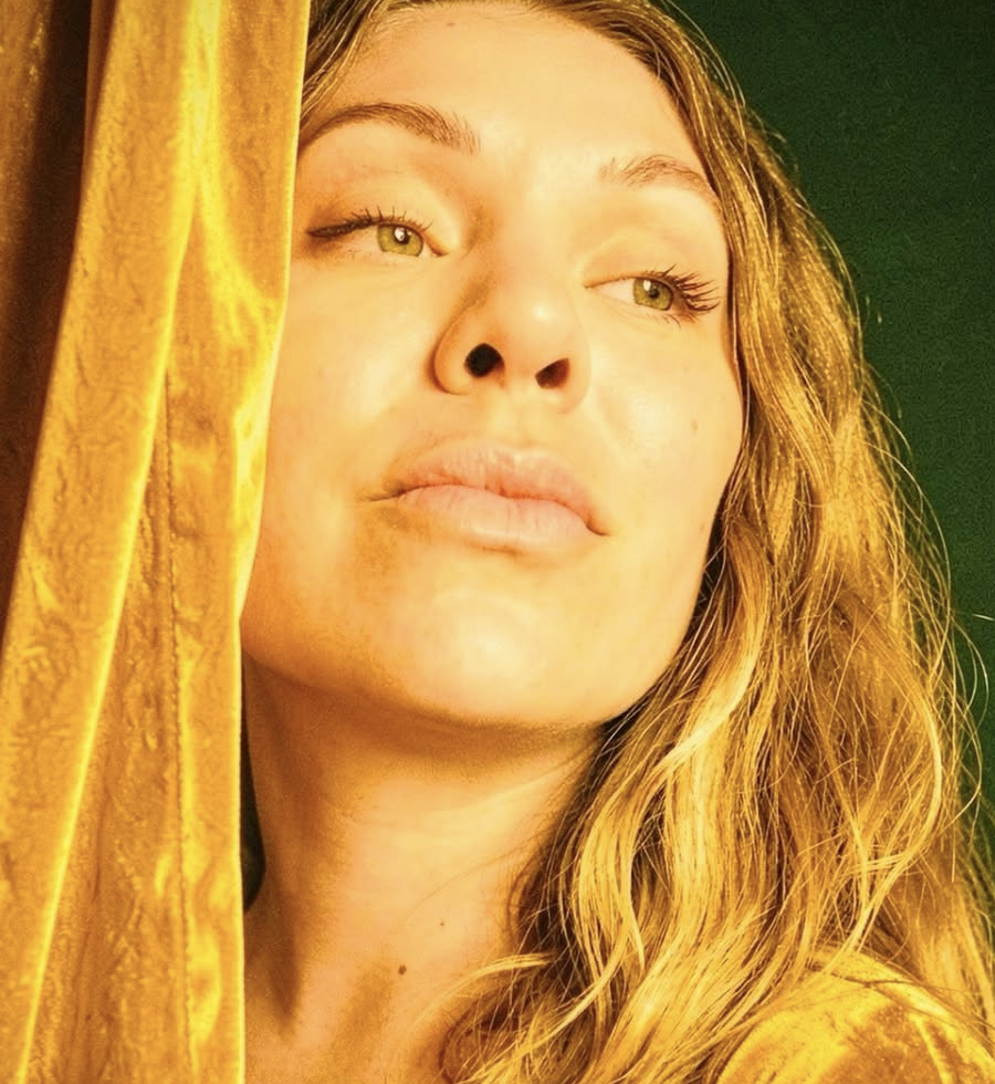 WildNomad41 in a gold-lit editorial portrait